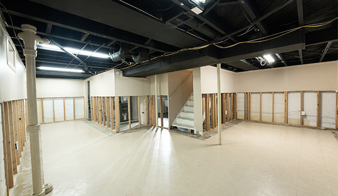 basement has been waterproofed and damaged drywall has been removed